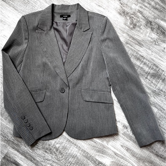 Blazer. New. Has shoulder pads. Larger fit on shoulders. Grey with stripes. - Picture 1 of 10